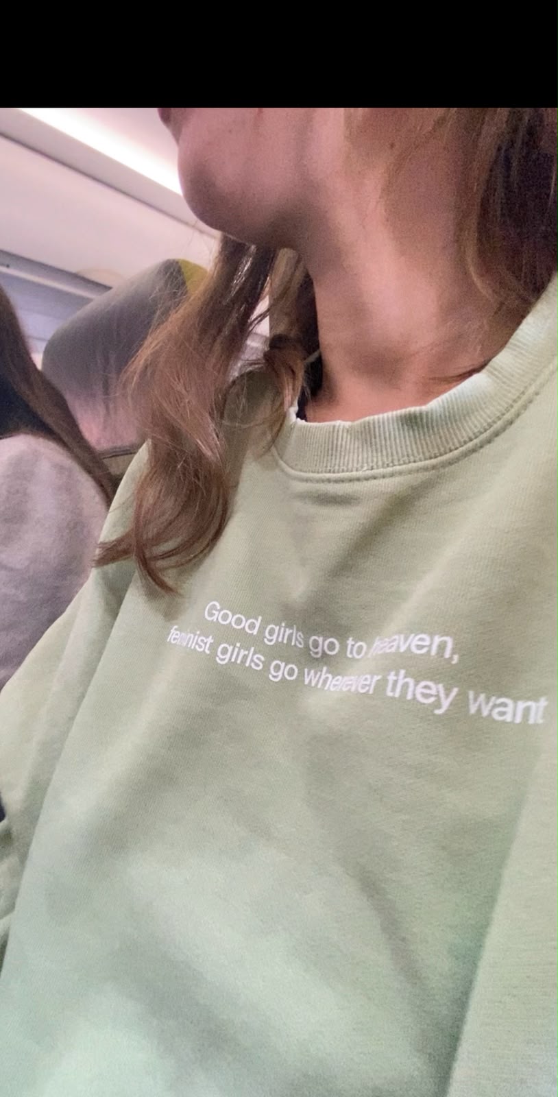 Sage sweatshirt printed 'Good girls go to heaven, feminist girls go wherever they want'
