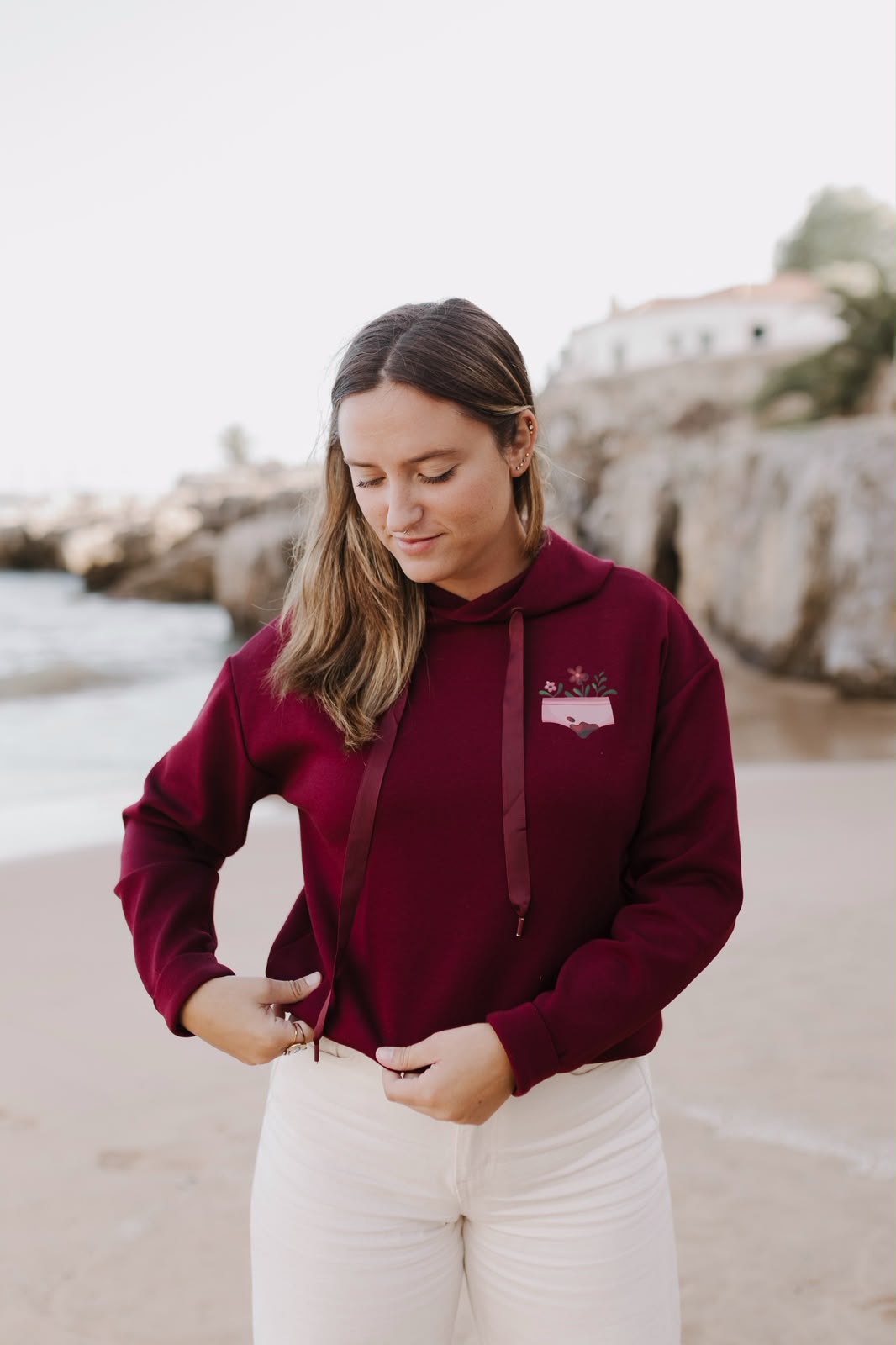 Burgundy cropped hoodie with a period underwear and flowers illustration