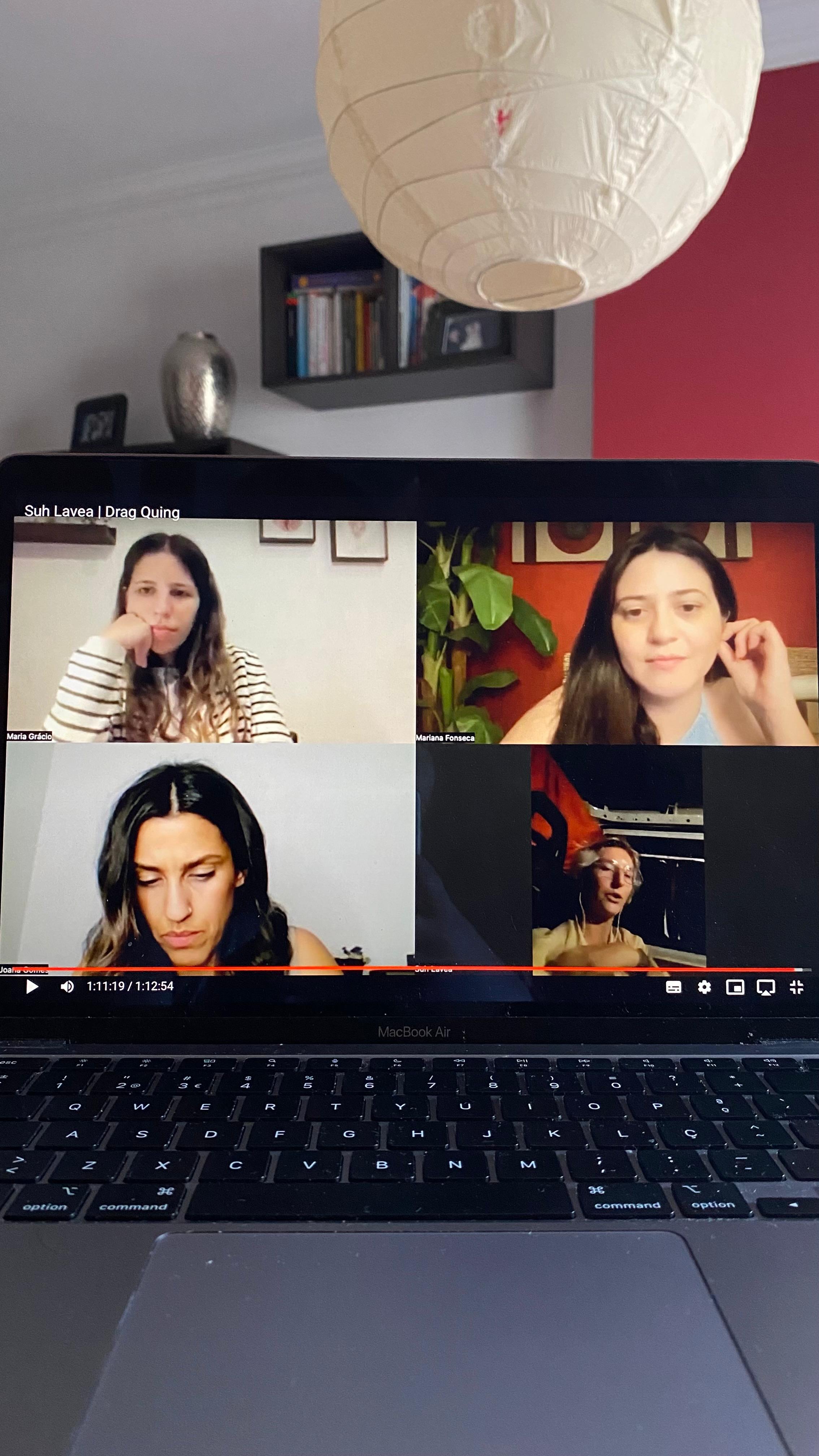 Laptop showing a recorded online session with Mariana and three guests