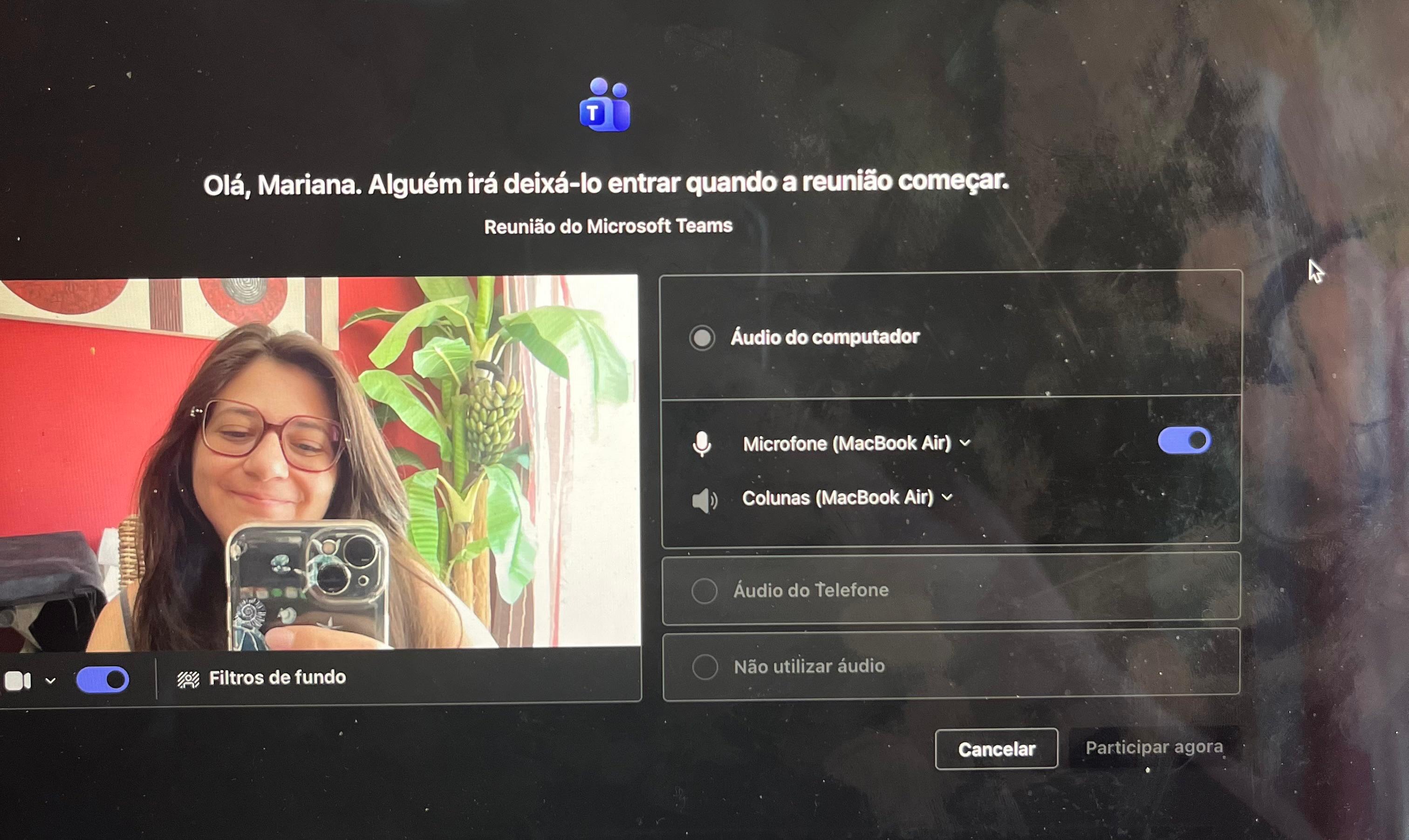 Mariana smiling on camera, about to start an online session on Microsoft Teams