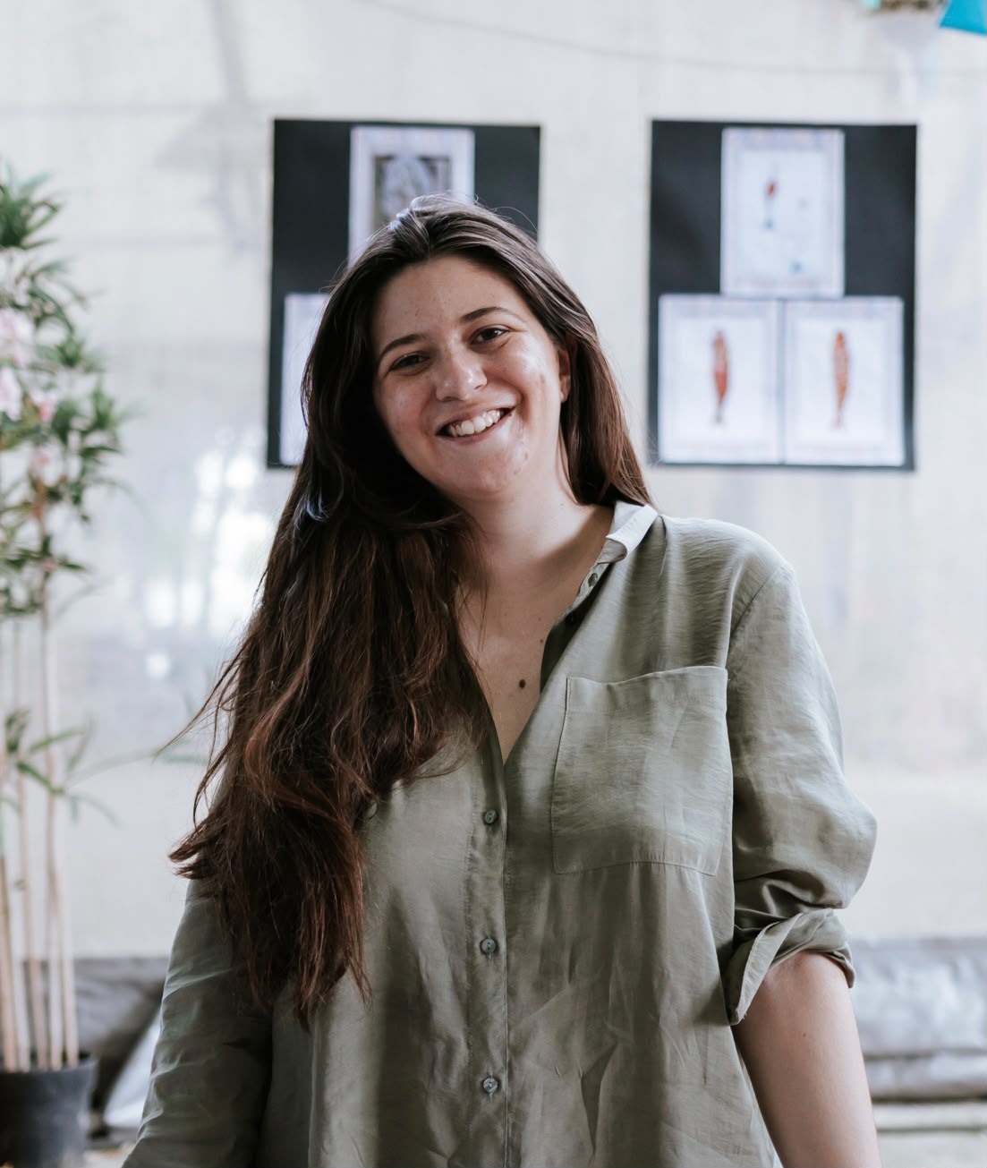 Mariana Fonseca smiling, wearing an olive shirt
